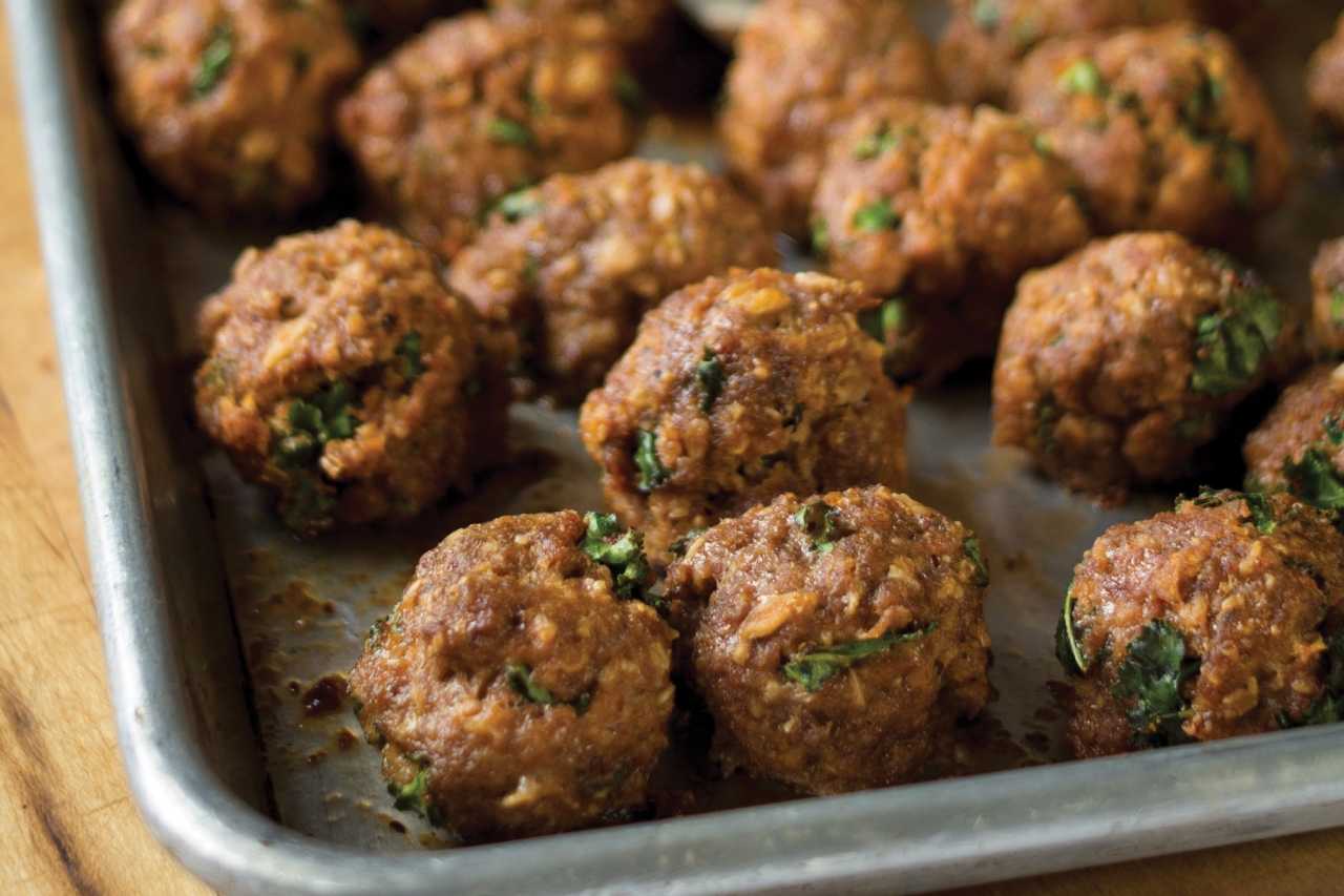 A sheet tray of meatballs