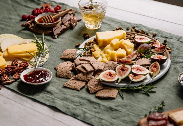 a holiday spread of Shelburne Farms cheddar and accompaniments