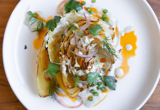 aerial view of charred cabbage on white plate